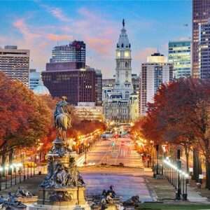 Dusk view of Philadelphia cityscape with historic buildings